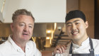 Restauranter Luke Mangan pictured with one of his chefs Carlos Byeon from South Korea.