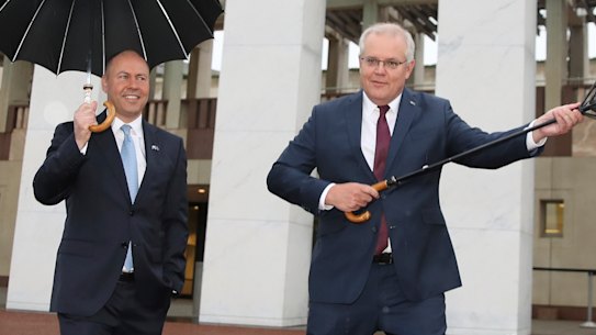 Treasurer Josh Frydenberg and Prime Minister Scott Morrison outside Parliament House.