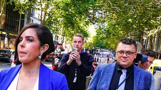 Moira Deeming and husband Andrew after they left party headquarters on Sunday.