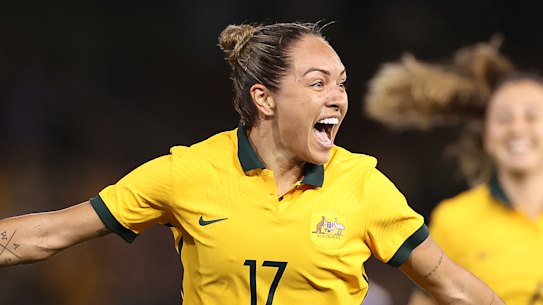 Kyah Simon celebrates after scoring against the US in a friendly in 2021.
