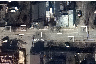 Satellite images provided by Maxar Technologies show Yablonska Street in Bucha, Ukraine, strewn with bodies on March 19, 2022.