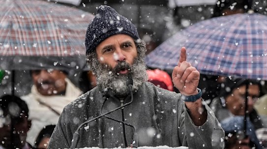 India’s opposition Congress party leader Rahul Gandhi, speaks at a public rally as it snows in Srinagar, Indian controlled Kashmir.