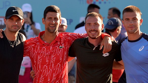 Novak Djokovic poses with Bulgaria's Grigor Dimitrov (left), Serbia's Viktor Troicki and Croatia's Borna Coric in Croatia. All have tested positive to COVID-19.