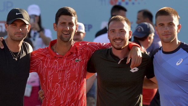 Novak Djokovic poses with Bulgaria's Grigor Dimitrov (left), Serbia's Viktor Troicki and Croatia's Borna Coric in Croatia. All have tested positive to COVID-19.