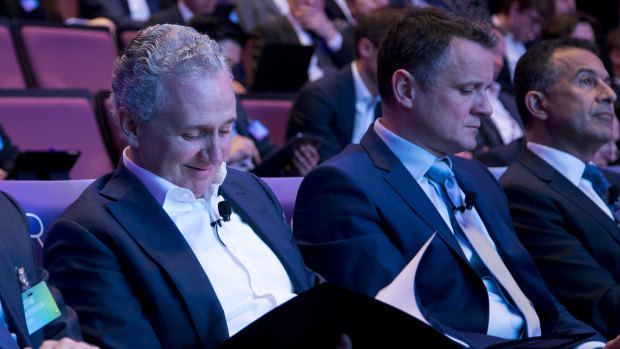 Telstra chief executive Andy Penn (left) and Michael Ackland (right) at Telstra's 5G announcement in Sydney in December. 