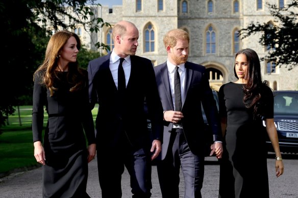 All eyes on Meghan: Catherine, Princess of Wales; William, Prince of Wales; Harry, Duke of Sussex; and Meghan, Duchess of Sussex at Windsor Castle this month.