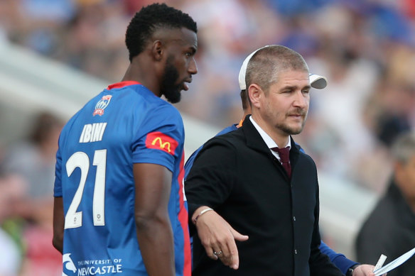 Bernie Ibini and then-Jets coach Carl Robinson, who he is set to follow to the Western Sydney Wanderers.