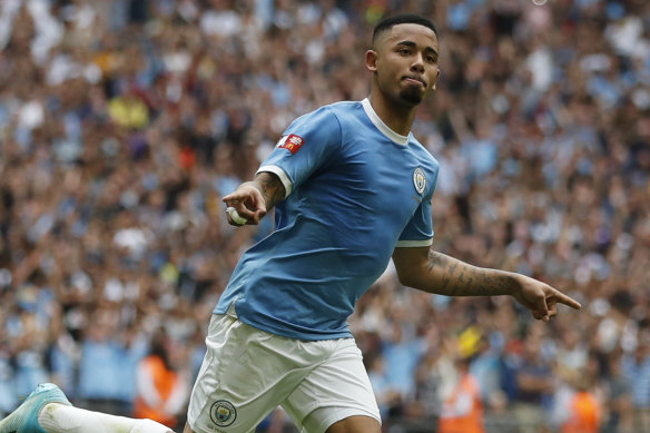 Spot on: Manchester City's Gabriel Jesus celebrates after scoring in the penalty shootout.