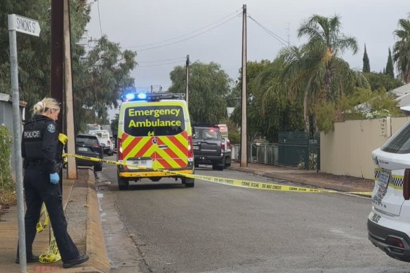 Emergency personnel tape off a street in Crystal Brook, South Australia on Wednesday.