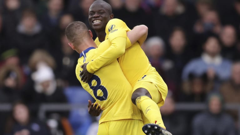 Chelsea's N'Golo Kante (right) celebrates with Ross Barkley after scoring against Crystal Palace at Selhurst Park on Sunday.