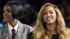 Beyoncé, right, and Kelly Rowland, left, on stage at a campaign event for Democratic presidential nominee Vice President Kamala Harris in Houston.