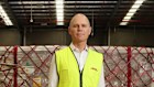 DHL executive George Lawson at their Matraville warehouse. George is in charge of the team moving F1 around the world.