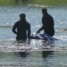 Police divers recover a body from a pond in The Lakes Golf Course that was found on Wednesday morning.