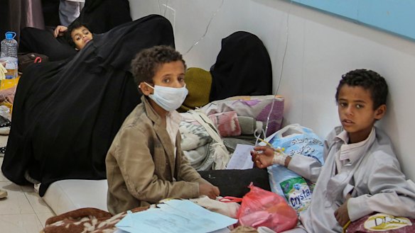 Patients suffering from severe diarrhoea and suspected of cholera, wait to receive treatment, at a hospital in Sanaa.