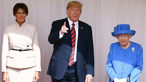 Britain's Queen Elizabeth II met briefly with Donald and Melania Trump.