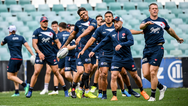 'I'll give him nothing': Latrell Mitchell trains with the Roosters on Monday.