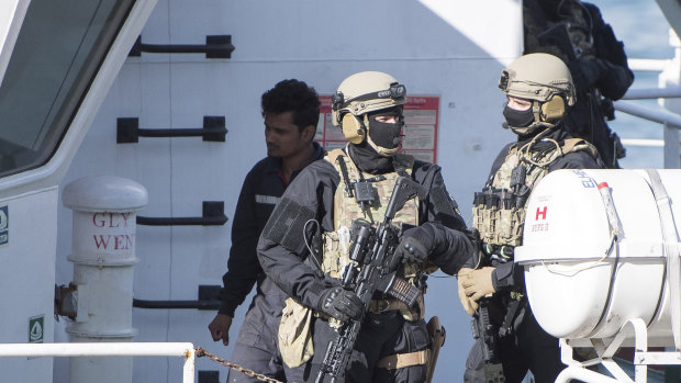 Armed forces aboard the Turkish oil tanker El Hiblue 1, which was hijacked by migrants. 