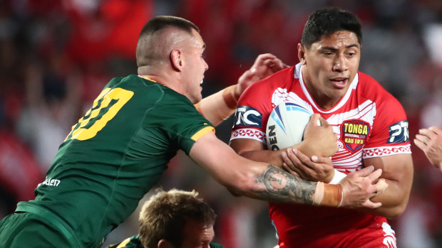 Jason Taumalolo, captain of Tonga, looks for a gap against the Kangaroos.