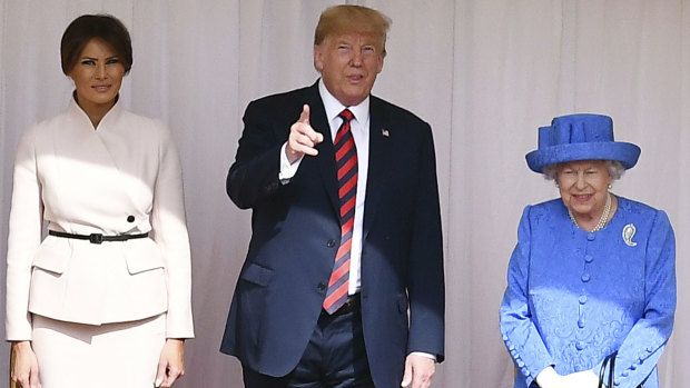 Britain's Queen Elizabeth II met briefly with Donald and Melania Trump.