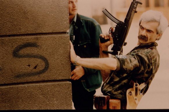 Fighting in the streets of Sarajevo, 1992. 