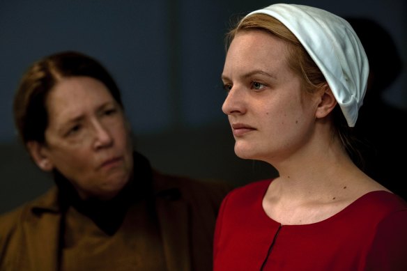 Ann Dowd and Elisabeth Moss in a scene from The Handmaid’s Tale.