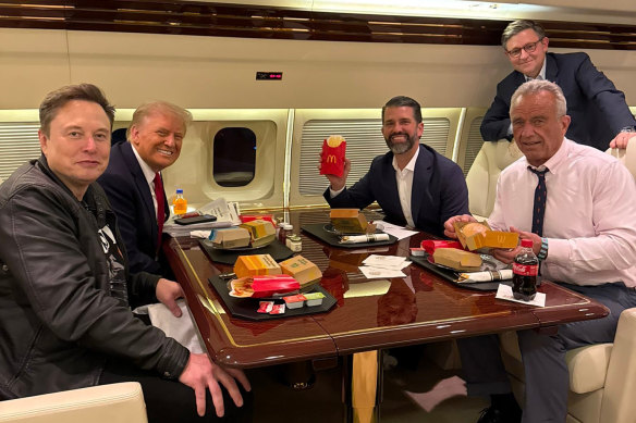 Left to right: Elon Musk, US President-elect Donald Trump, Donald Trump jnr, Mike Johnson and Robert F. Kennedy enjoy a McDonald’s meal aboard Trump’s private plane.