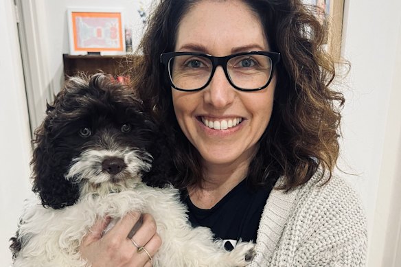 Nicola Redhouse with her cavoodle, Arthur, who rules her house.