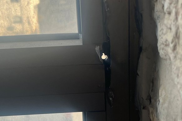 The bullet hole in the window frame of Ranem Abu-Izneid’s accommodation.