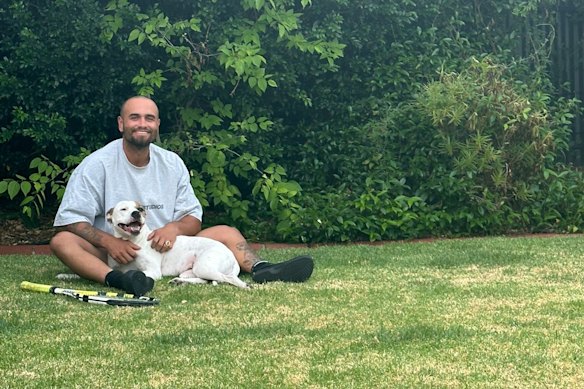 Jake Weatherald with his dog, Ivy.