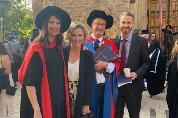 With children (from left) Anna, Alex and Daniel, in 2021, receiving an honorary degree of Doctor of Arts at the University of Adelaide.