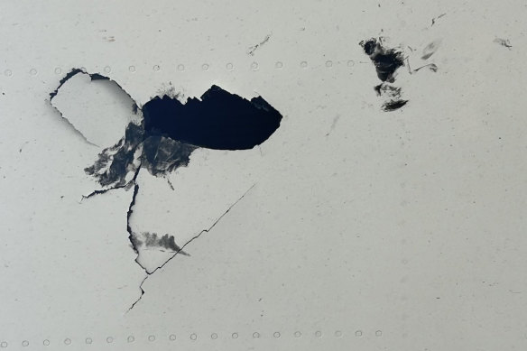 Cracks in the Qantas 787’s wing after it was hit by tread from a wheel during take-off in Rome.