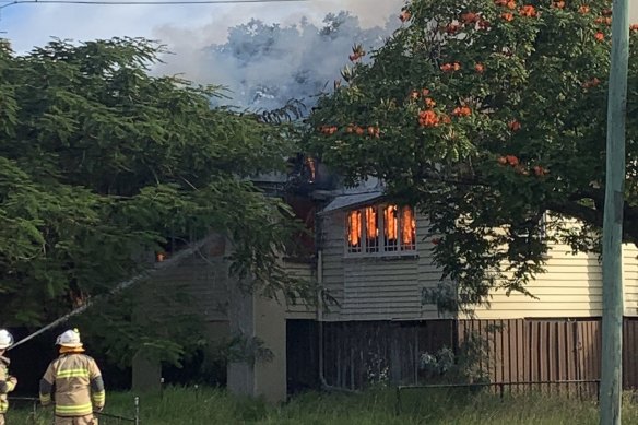 Fire crews were called to the house on Nudgee Road at Hamilton about 1.45pm on Sunday.