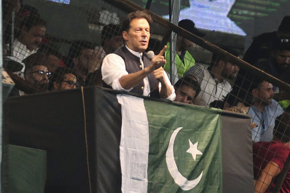 Pakistani opposition leader Imran Khan, centre, addresses his party supporters in Lahore last week.