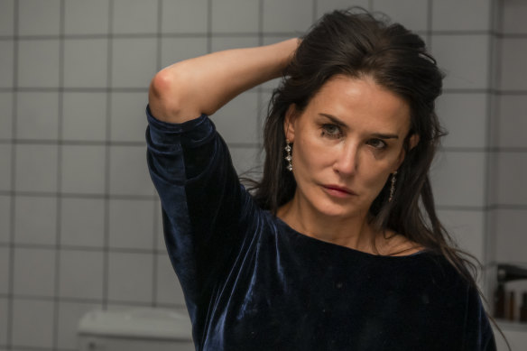 Demi Moore as Elisabeth Sparkle, a TV exercise show presenter deemed past it by her station boss (Dennis Quaid), in The Substance.