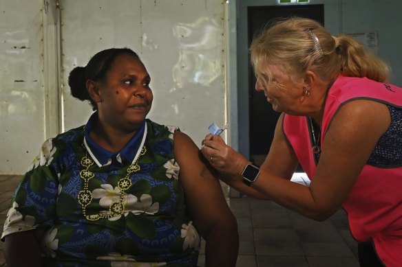 (File Image) Norah Tabuai receives her second AstraZeneca COVID-19 vaccination on Saibai Island in the Torres Strait in June.