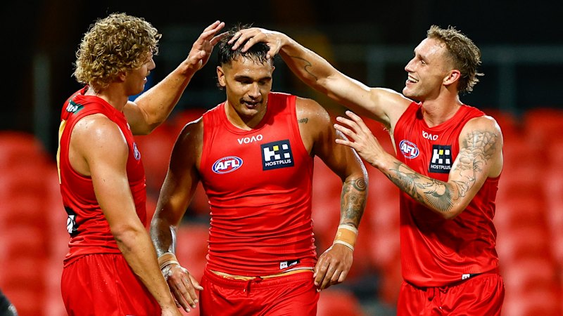 Gold Coast Suns select him for first AFL match in 596 days; Collingwood Magpies leave Darcy Moore out of Anzac Day clash