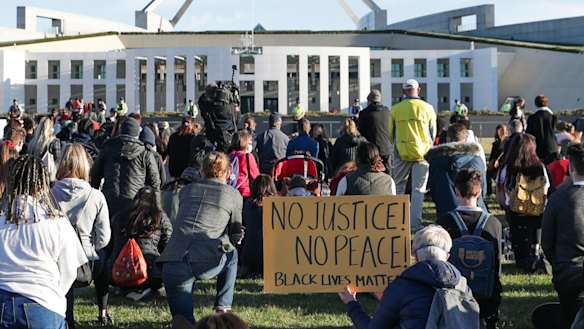 A Black Lives Matter protest at the front of Parliament House in Canberra on Saturday.