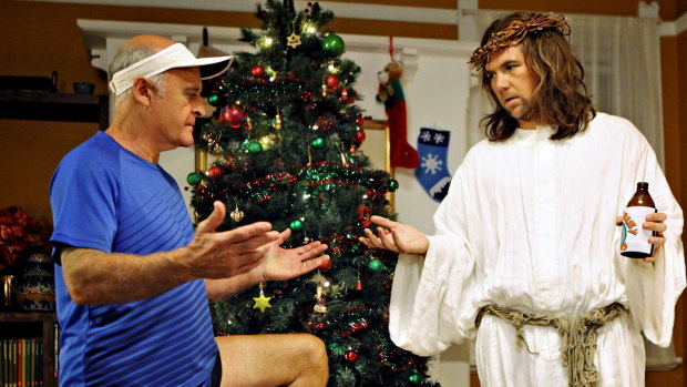 Kevin Moody (Danny Adcock) talks to Sean (Patrick Brammall), who is wearing an out-of-season crown of thorns for the nativity in A Moody Christmas.  