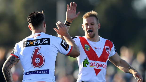 Puff they go: Gareth Widdop and Matt Dufty celebrate on their way to a tough win in Mudgee.