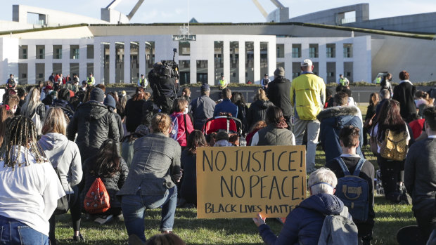A Black Lives Matter protest at the front of Parliament House in Canberra on Saturday.