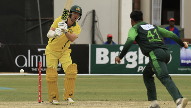 Skittled: Australia's Travis Head is clean bowled during defeat to Pakistan earlier this year.