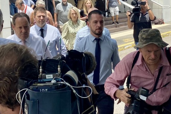 NT Police Officer Zachary Rolfe, centre, with barrister David Edwardson, QC, on his right, leave court to await a verdict.