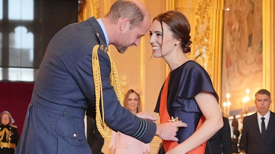 Jacinda Ardern, right, is made a Dame Grand Commander of the New Zealand Order of Merit by the Prince of Wales, left, at Windsor Castle on October 16.