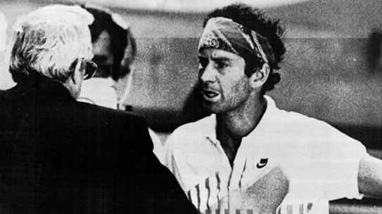 McEnroe argues with tournament director Ken Farrar.
