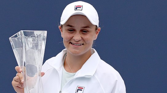 Ashleigh Barty of Australia poses with the winner’s trophy.