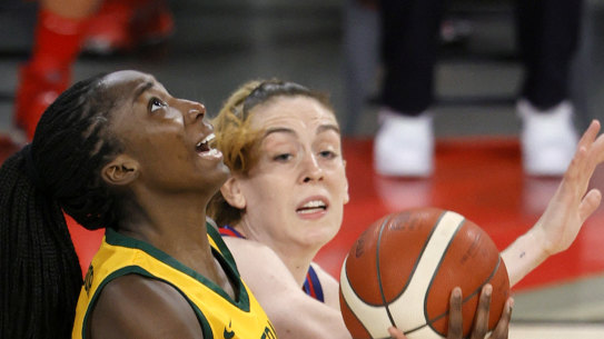 Ezi Magbegor of the Opals shoots against Katie Ebzery
