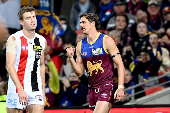 Joe Daniher celebrates after kicking a goal for the Lions.