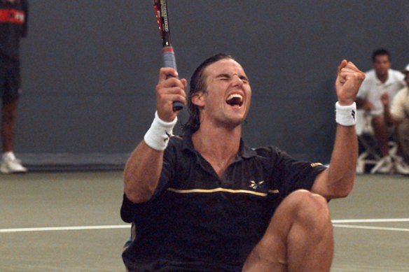 Rafter celebrates his 6-3, 6-2, 4-6, 7-5 win over Great Britain’s Greg Rusedski.