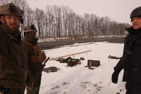 Darren Conway (behind the camera) in Kharkiv, Ukraine with BBC reporter Quentin Sommerville (right).