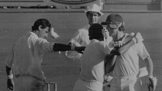 Craig McDermott and Mike Whitney celebrate batting out for a draw against New Zealand in 1987, as Richard Hadlee offers his congratulations.